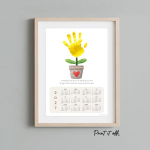 Flower pot handprint art created with a child's painted handprint and printable 2027 yearly calendar.