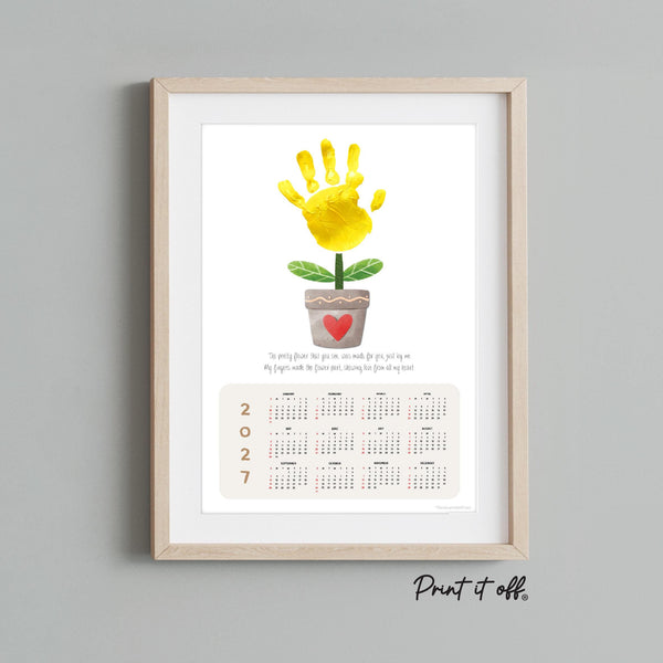 Flower pot handprint art created with a child's painted handprint and printable 2027 yearly calendar.