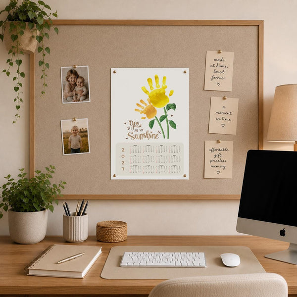 Sunflower handprint art calendar made using a child's painted handprint with printable 2027 calendar design - print it off